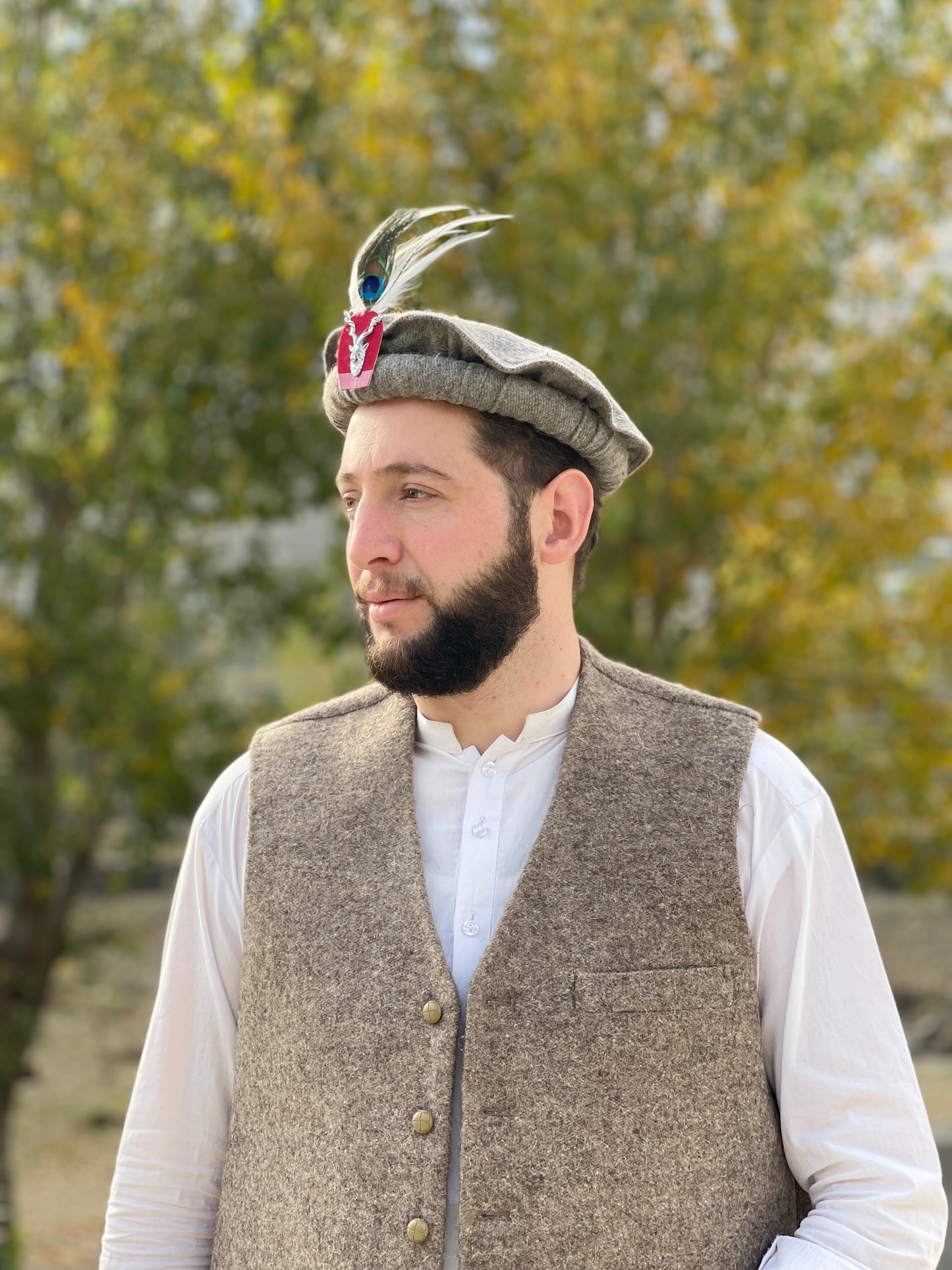 Chitrali Cap With Feather and Makhor Lapel Pin - Chitral Wool