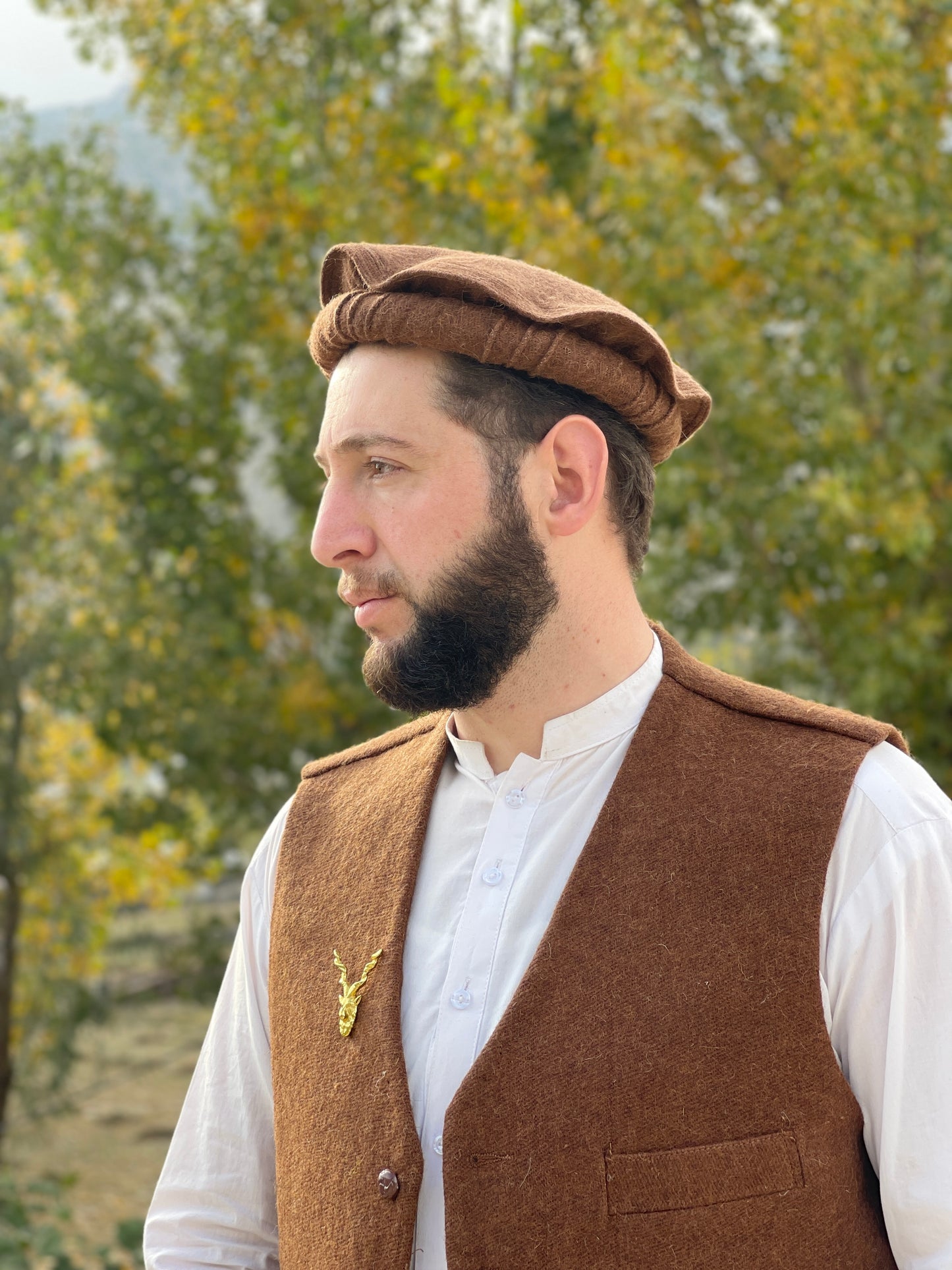 Men wearing Chitrali Kapol