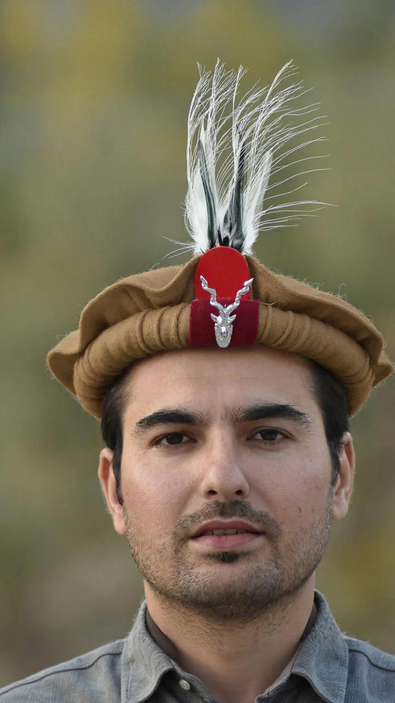 Chitrali Woolen Cap With Feather and Makhor Lapel Pin - Chitral Wool