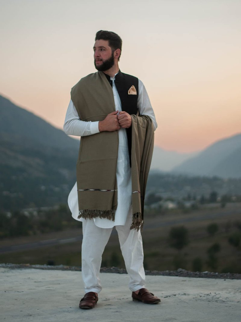 men wearing handwoven men's shawl in angora color