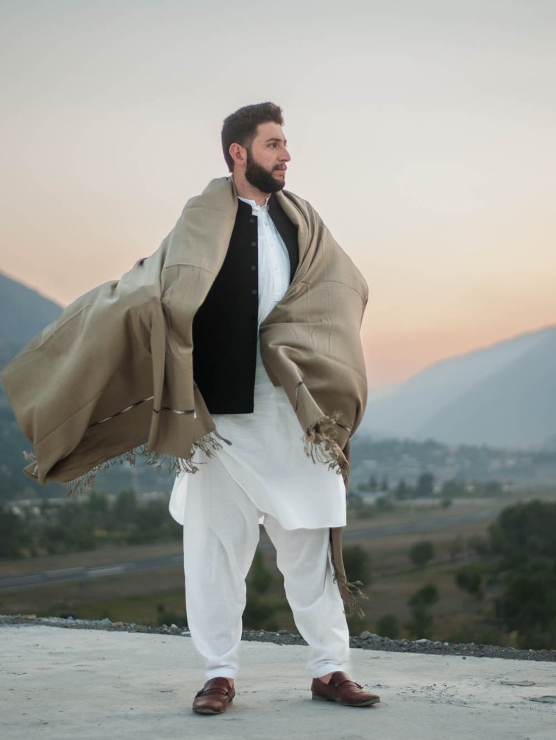 men wearing handwoven men's shawl in angora color