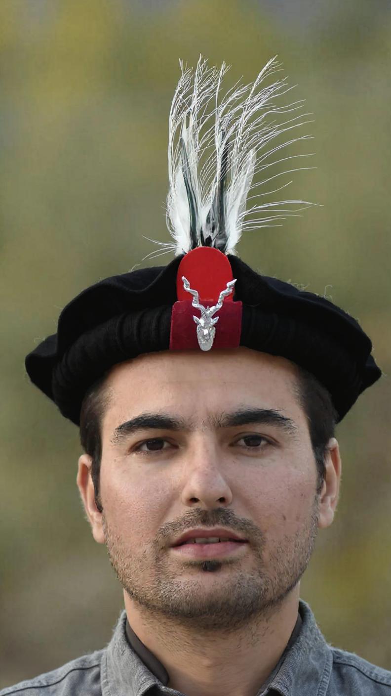 Chitrali Woolen Cap With Feather and Makhor Lapel Pin - Chitral Wool